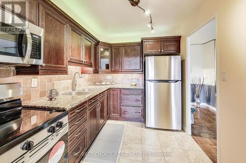 403 - 10 Edgecliff Golfway, Toronto, ON - Indoor Photo Showing Kitchen With Stainless Steel Kitchen With Double Sink With Upgraded Kitchen