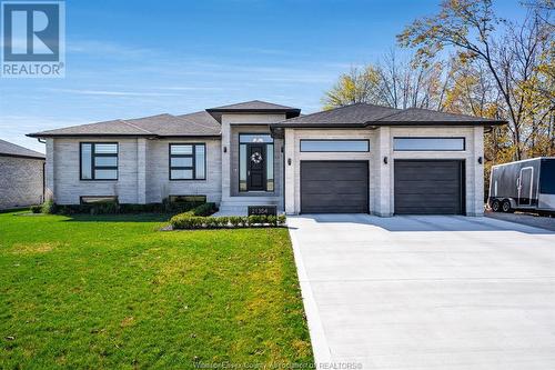 21354 Klondyke Road, Wheatley, ON - Outdoor With Facade