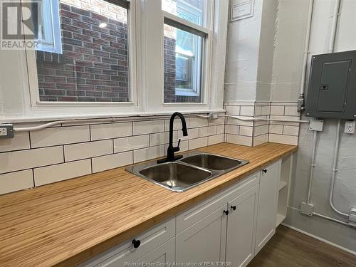 2308 Highland, Windsor, ON - Indoor Photo Showing Kitchen With Double Sink