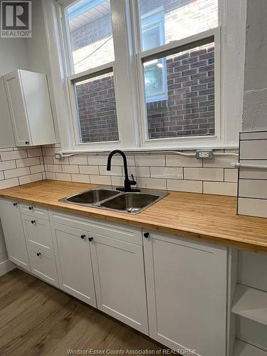 2308 Highland, Windsor, ON - Indoor Photo Showing Kitchen With Double Sink