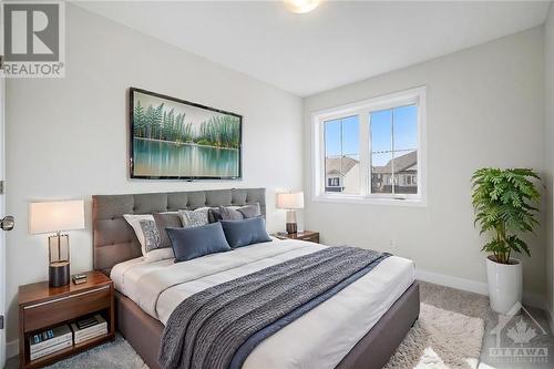 This photo has been virtually staged. - 24 Margaret Graham Terrace, Smiths Falls, ON - Indoor Photo Showing Bedroom