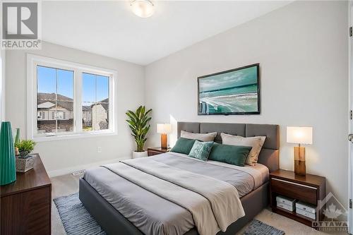 This photo has been virtually staged. - 24 Margaret Graham Terrace, Smiths Falls, ON - Indoor Photo Showing Bedroom