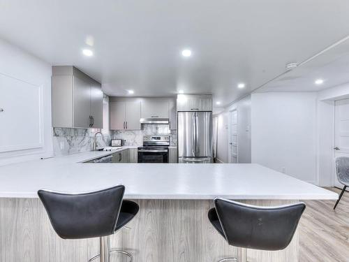 Kitchen - 10719 Rue André-Jobin, Montréal (Ahuntsic-Cartierville), QC - Indoor Photo Showing Kitchen With Upgraded Kitchen