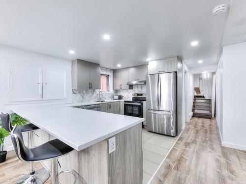 Kitchen - 10719 Rue André-Jobin, Montréal (Ahuntsic-Cartierville), QC - Indoor Photo Showing Kitchen With Upgraded Kitchen