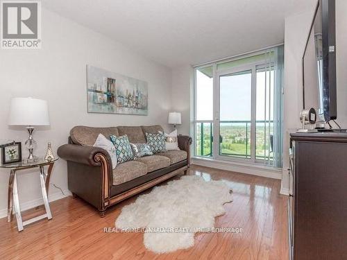 1406 - 4879 Kimbermount Avenue, Mississauga, ON - Indoor Photo Showing Living Room