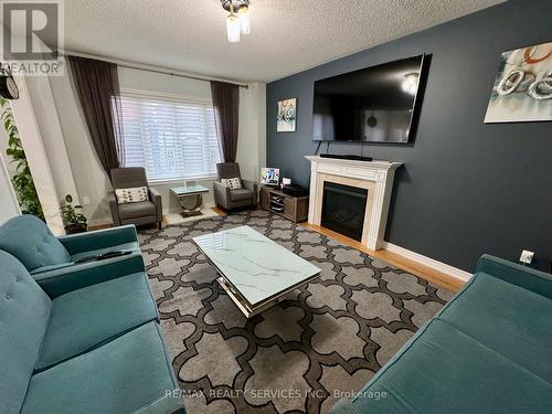 52 Valleyscape Trail, Caledon, ON - Indoor Photo Showing Living Room With Fireplace