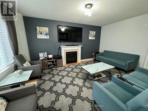 52 Valleyscape Trail, Caledon, ON - Indoor Photo Showing Living Room With Fireplace