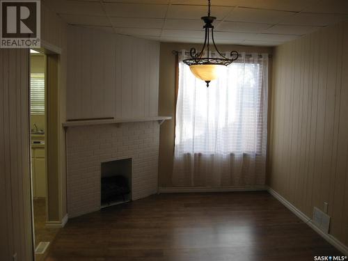 1043 Connaught Avenue, Moose Jaw, SK - Indoor Photo Showing Other Room With Fireplace