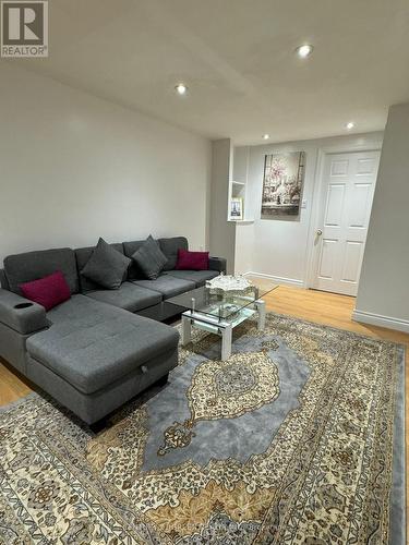 Bsmt - 18 Fiddlehead Terrace, Toronto, ON - Indoor Photo Showing Living Room