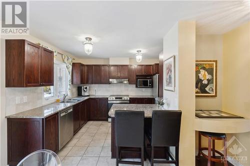 120C Centrepointe Drive, Ottawa, ON - Indoor Photo Showing Kitchen With Double Sink