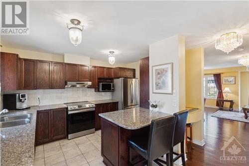 120C Centrepointe Drive, Ottawa, ON - Indoor Photo Showing Kitchen With Double Sink