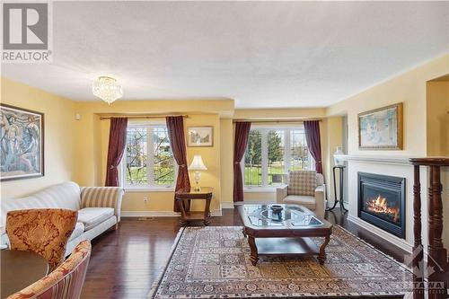 120C Centrepointe Drive, Ottawa, ON - Indoor Photo Showing Living Room With Fireplace