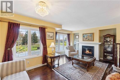 120C Centrepointe Drive, Ottawa, ON - Indoor Photo Showing Living Room With Fireplace