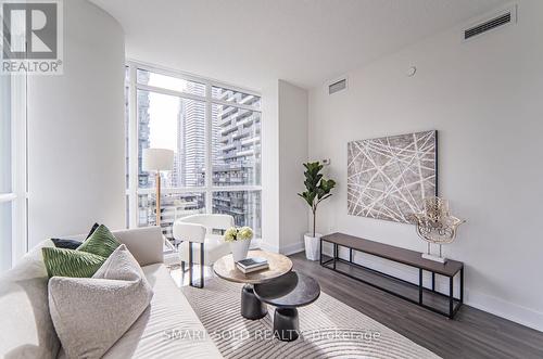 1210 - 30 Roehampton Avenue, Toronto, ON - Indoor Photo Showing Living Room