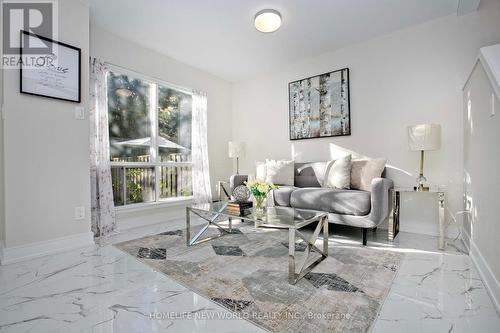 313 - 17 Liszt Gate, Toronto, ON - Indoor Photo Showing Living Room