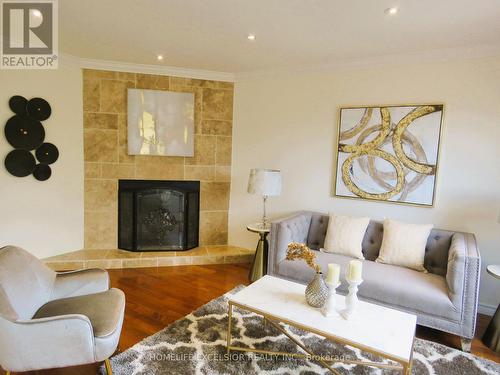 65 Reed Drive, Ajax, ON - Indoor Photo Showing Living Room With Fireplace