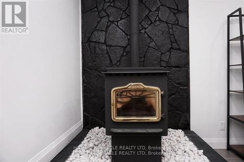 357 Britannia Road, Huntsville, ON - Indoor With Fireplace