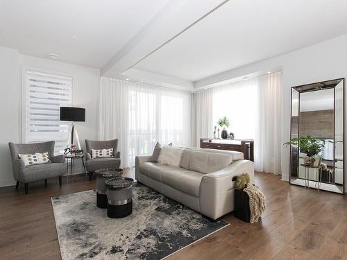 Living room - 303-12000 Rue D'Amboise, Mirabel, QC - Indoor Photo Showing Living Room