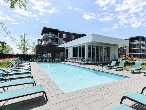 Pool - 303-12000 Rue D'Amboise, Mirabel, QC - Outdoor With In Ground Pool