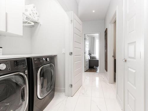 Laundry room - 303-12000 Rue D'Amboise, Mirabel, QC - Indoor Photo Showing Laundry Room