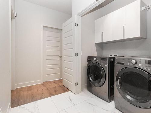 Salle de lavage - 302-12000 Rue D'Amboise, Mirabel, QC - Indoor Photo Showing Laundry Room