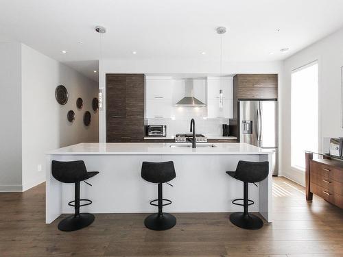 Cuisine - 302-12000 Rue D'Amboise, Mirabel, QC - Indoor Photo Showing Kitchen With Upgraded Kitchen