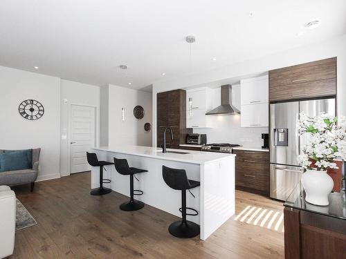 Cuisine - 302-12000 Rue D'Amboise, Mirabel, QC - Indoor Photo Showing Kitchen With Upgraded Kitchen