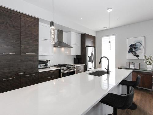 Coin-repas - 302-12000 Rue D'Amboise, Mirabel, QC - Indoor Photo Showing Kitchen With Upgraded Kitchen