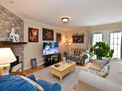 Living room - 2-490 Rue De La Colline, Sainte-Adèle, QC - Indoor Photo Showing Living Room With Fireplace