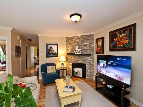 Living room - 2-490 Rue De La Colline, Sainte-Adèle, QC - Indoor Photo Showing Living Room With Fireplace