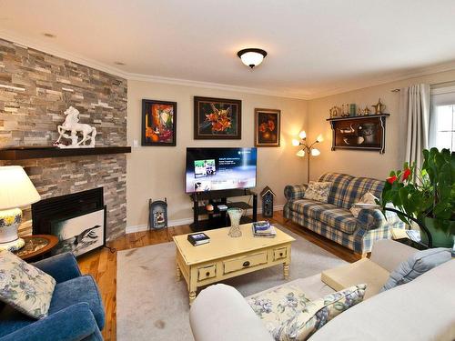 Living room - 2-490 Rue De La Colline, Sainte-Adèle, QC - Indoor Photo Showing Living Room With Fireplace