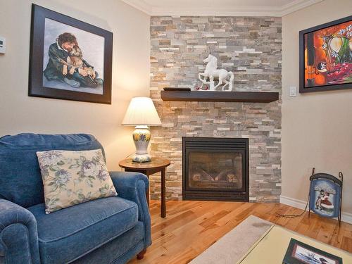 Living room - 2-490 Rue De La Colline, Sainte-Adèle, QC - Indoor Photo Showing Living Room With Fireplace