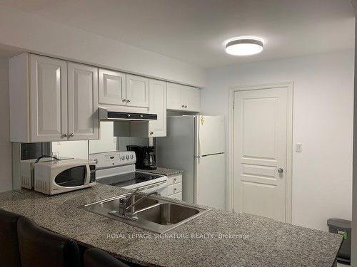 1602-801 Bay St, Toronto, ON - Indoor Photo Showing Kitchen With Double Sink