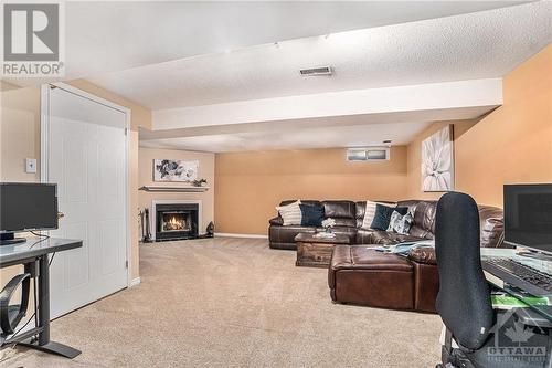 95 Randall James Drive, Stittsville, ON - Indoor Photo Showing Office With Fireplace