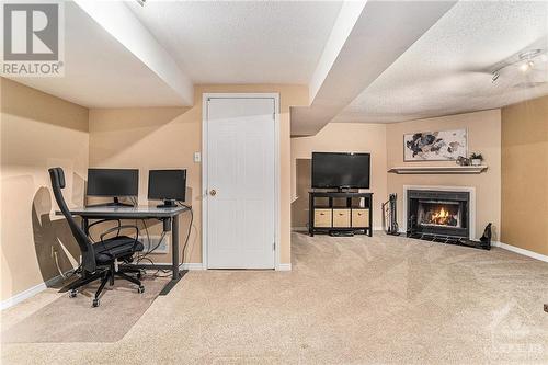 95 Randall James Drive, Stittsville, ON - Indoor With Fireplace