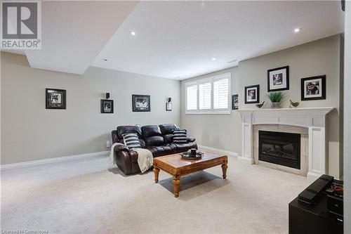 144 Ottawa Avenue, Woodstock, ON - Indoor Photo Showing Living Room With Fireplace