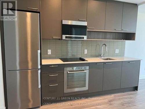 306 - 3005 Pine Glen Road, Oakville, ON - Indoor Photo Showing Kitchen With Double Sink With Upgraded Kitchen