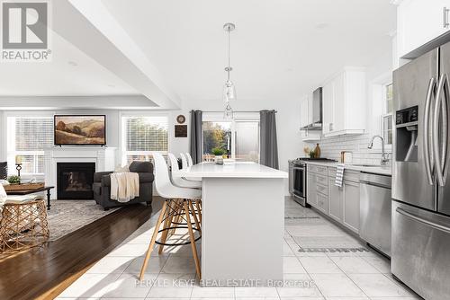 74 Fieldstream Chase, Bracebridge, ON - Indoor Photo Showing Kitchen With Fireplace With Upgraded Kitchen