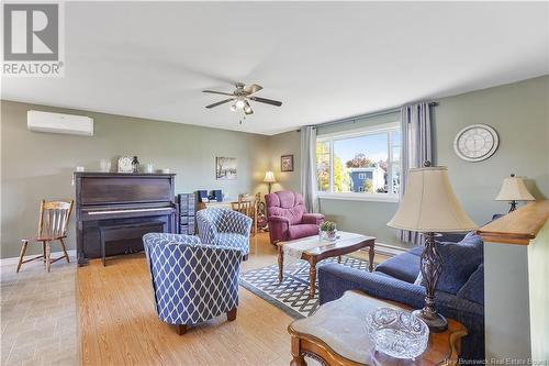 16 Southampton Court, Hartland, NB - Indoor Photo Showing Living Room With Fireplace