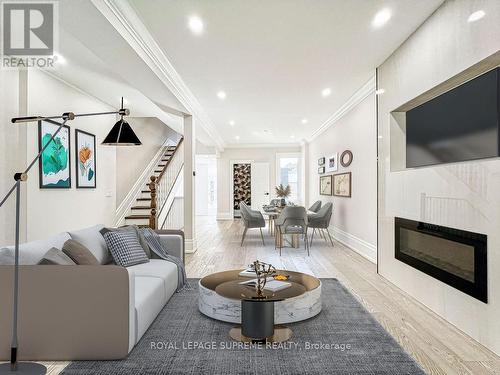 411 Concord Avenue, Toronto, ON - Indoor Photo Showing Living Room With Fireplace