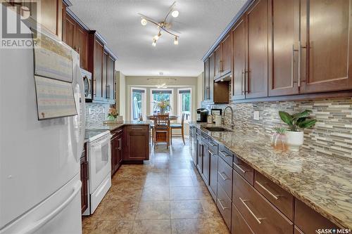 22 Elisia Drive, Moose Jaw, SK - Indoor Photo Showing Kitchen With Upgraded Kitchen