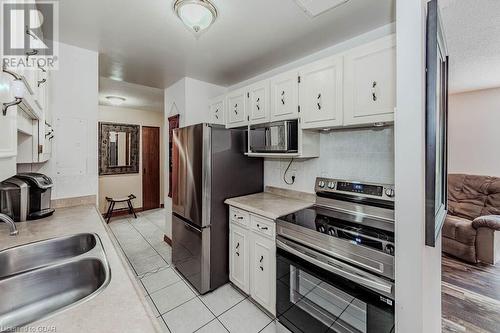 234 Willow Road Unit# 307, Guelph, ON - Indoor Photo Showing Kitchen With Stainless Steel Kitchen With Double Sink