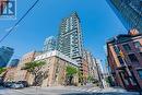 1205 - 126 Simcoe Street, Toronto, ON  - Outdoor With Facade 