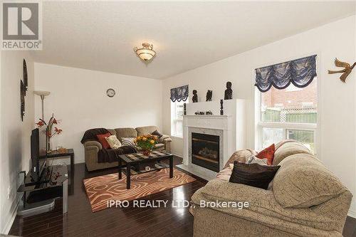 5458 Longford Drive, Mississauga, ON - Indoor Photo Showing Living Room With Fireplace