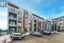 429 - 95 Dundas Street E, Oakville, ON  - Outdoor With Facade 