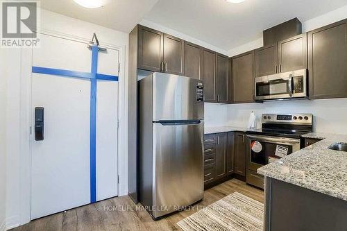 429 - 95 Dundas Street E, Oakville, ON - Indoor Photo Showing Kitchen With Stainless Steel Kitchen With Upgraded Kitchen