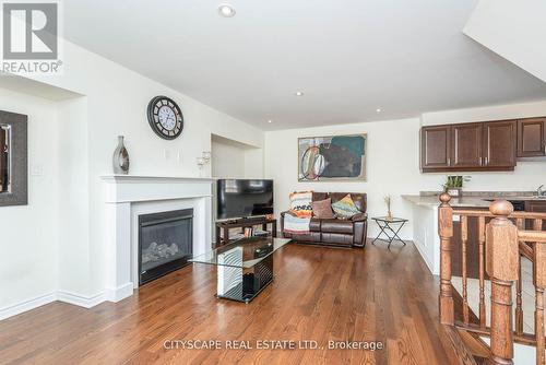 85 - 1000 Asleton Boulevard, Milton, ON - Indoor Photo Showing Living Room With Fireplace