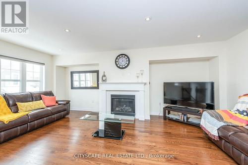 85 - 1000 Asleton Boulevard, Milton, ON - Indoor Photo Showing Living Room With Fireplace