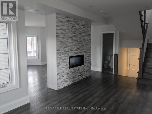 3 Beverly Street, Springwater, ON - Indoor Photo Showing Living Room With Fireplace