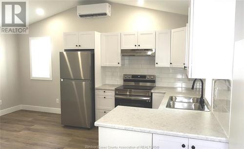 131 Alma Unit# A & B, Amherstburg, ON - Indoor Photo Showing Kitchen With Stainless Steel Kitchen With Double Sink